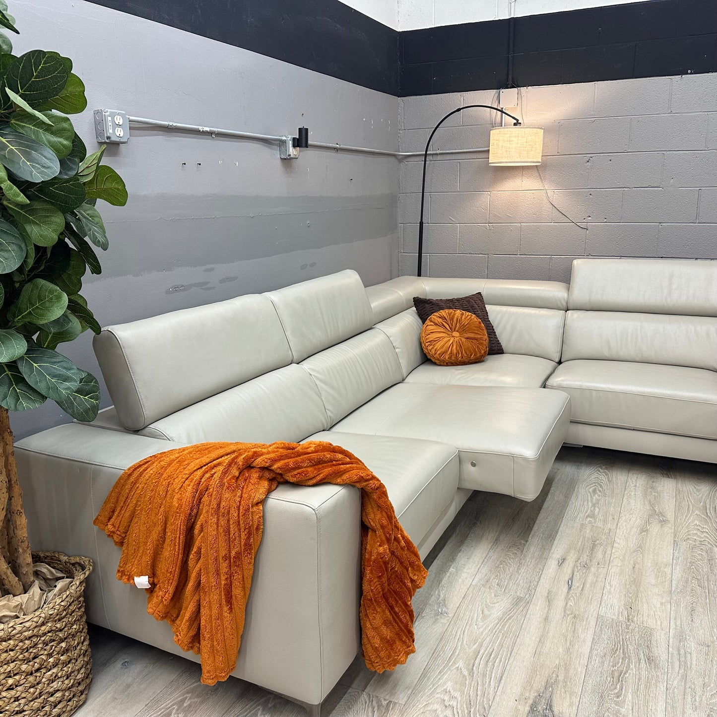 Claudius Leather Sectional with Power Seats and Adjustable Headrest